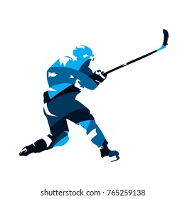 Ice hockey player shooting puck, abstract blue vector silhouette