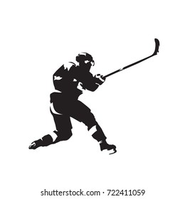 Ice hockey player skating and shooting, isolated vector silhouette