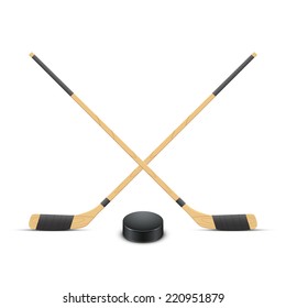 Ice Hockey puck and sticks. Sport symbol. Vector Illustration isolated on white background