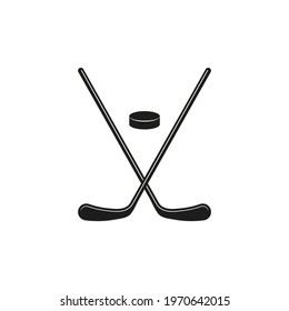 Ice hockey rubber puck and sticks of crossed, icon isolated on white background. Sports equipment for winter games. Silhouette simple flat design. Vector illustration.