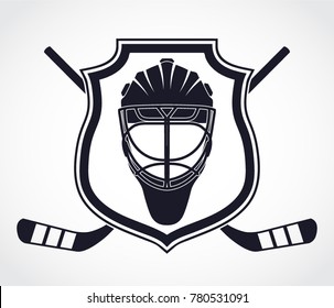 ice hockey theme with shield crossed hockey stickes and helmet heraldry symbol