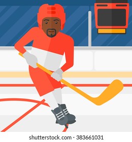 Ice-hockey player with stick.
