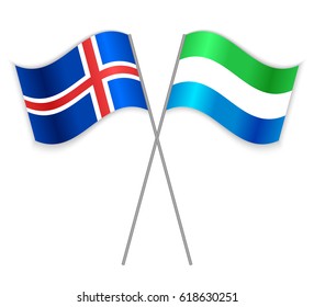 Icelandic and Sierra Leonean crossed flags. Iceland combined with Sierra Leone isolated on white. Language learning, international business or travel concept.