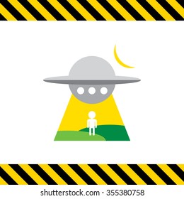 Icon of alien spaceship abducting man's silhouette at night