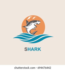icon of angry shark with sea waves