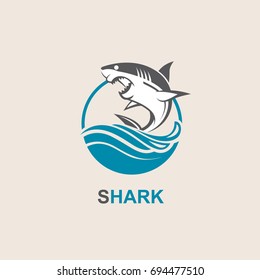 icon of angry shark with sea waves