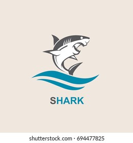 icon of angry shark with sea waves