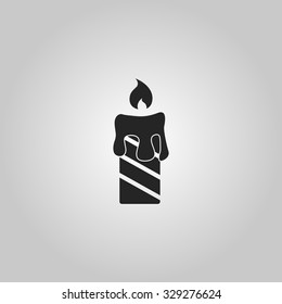 Icon burning candles.
