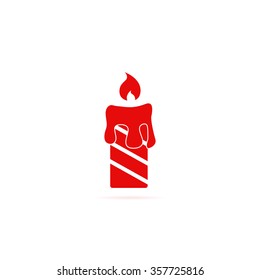 Icon burning candles.