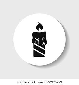 Icon burning candles.