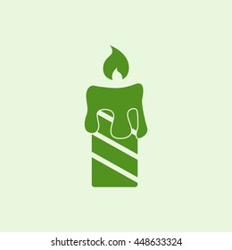 Icon burning candles.