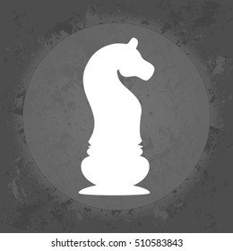Icon chess knight on gray vintage background . Minimalism. Icon Logo