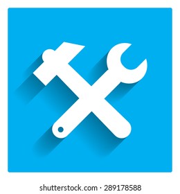 Icon of crossed hummer and spanner