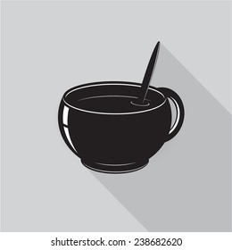 icon. A cup with a spoon on a gray background