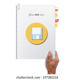 Icon diskette printed on book over white background