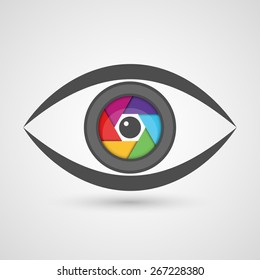 Icon eye as camera lens with colorful diaphragm shutter. Vector illustration