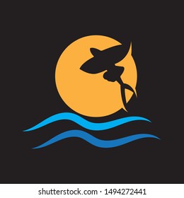 ICON OF FLYING FISH WITH WAVES