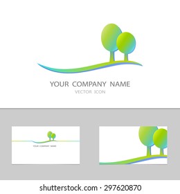 Icon with green land and two oval trees. Logo design.
