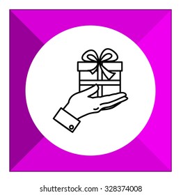 Icon of manÃ¢??s hand holding gift box with ribbon and bow