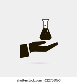 Icon of a hand and laboratory glassware.