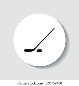 Icon hockey stick and puck.