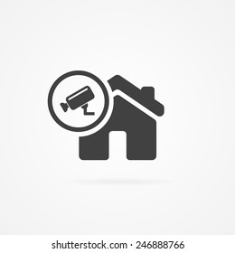 Icon of house with camera sign.
