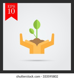 Icon of human hands holding green sprout