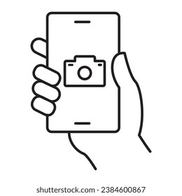 An icon illustrating a smartphone with a camera icon on the screen, emphasizing smartphone camera mode, handheld photography, a mobile photography app, and a camera function display.