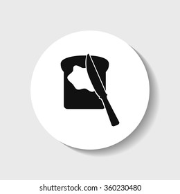 Icon knife with butter on bread.