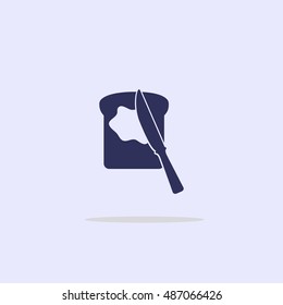 Icon knife with butter on bread.