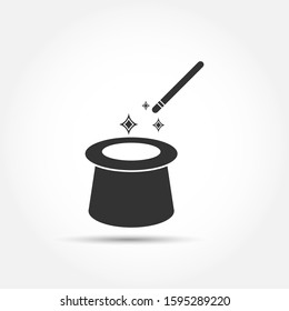 Icon of the magician's magic cylinder. A magic cylinder and a magic wand for magic and miracles. Flat style.