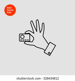Icon of man hand holding credit card with two fingers