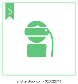 Icon of man wearing virtual reality device 