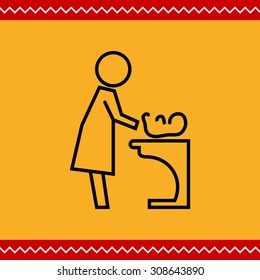 Icon of mother changing diaper with baby lying on changing table