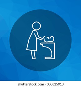Icon of mother changing diaper with baby lying on changing table