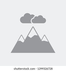 Icon of natural landscape with mountains and clouds