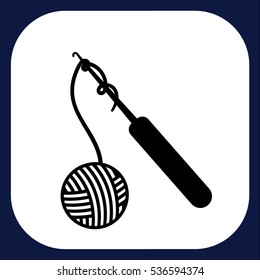 An icon on crotchet and threads for creating handmade knitting goods
