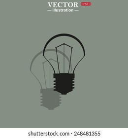 Icon on a green background with shadow. incandescent bulb, vector illustration, EPS 10