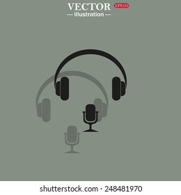 Icon on a green background with shadow. Headphones. Musical accessory,   vector illustration, EPS 10