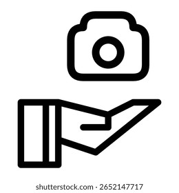ícone de uma mão aberta segurando uma câmera. Representa serviço de fotografia, suporte, doação, compartilhamento de equipamento ou criação de mídia.