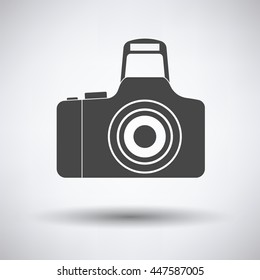 Icon of photo camera on gray background, round shadow. Vector illustration.