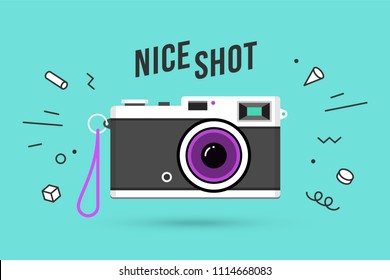 Icon of photo camera. Retro camera isolated on a blue mint background and explosive memphis graphic element and text Nice Shot. Vector Illustration