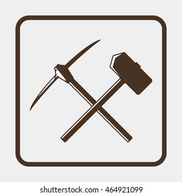 Icon with a pick-axe and hammer.