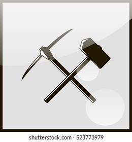 Icon with a pick-axe and hammer.