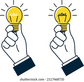 
Icon or pictogram of a hand holding a light bulb that turns on. Symbol of an idea or genius through light. The word idea is written with filament