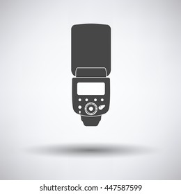 Icon of portable photo flash on gray background, round shadow. Vector illustration.