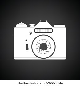 Icon of retro film photo camera. Black background with white. Vector illustration.