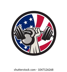 Icon retro style illustration of an American hand lifting a barbell and kettlebell with United States of America star spangled banner or stars and stripes flag set inside circle isolated background.