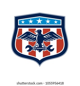 Icon retro style illustration of an American mechanic bald eagle clutching spanner wrench with United States of America USA star spangled banner or stars stripes flag inside crest isolated background.