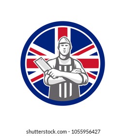 Icon retro style illustration of British butcher arms crossed holding a meat cleaver viewed from front  with United Kingdom UK, Great Britain Union Jack flag set inside circle on isolated background.